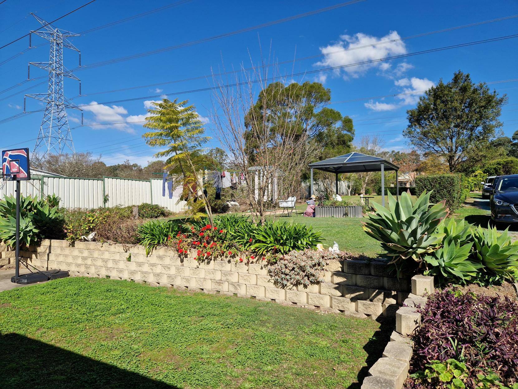 Garden with flower beds.