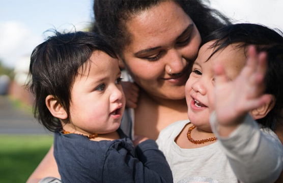 Housing & Homelessness | Mom with kids | Hero Image