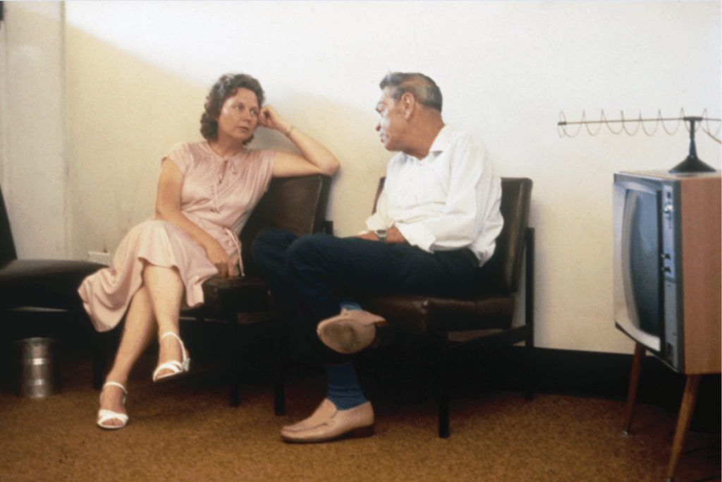 Woman speaking with a man at Wesley Edward Eagar Centre