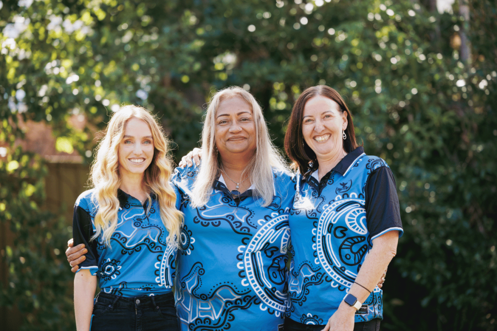 Three older women, representing the compassionate community supporting homeless youth.